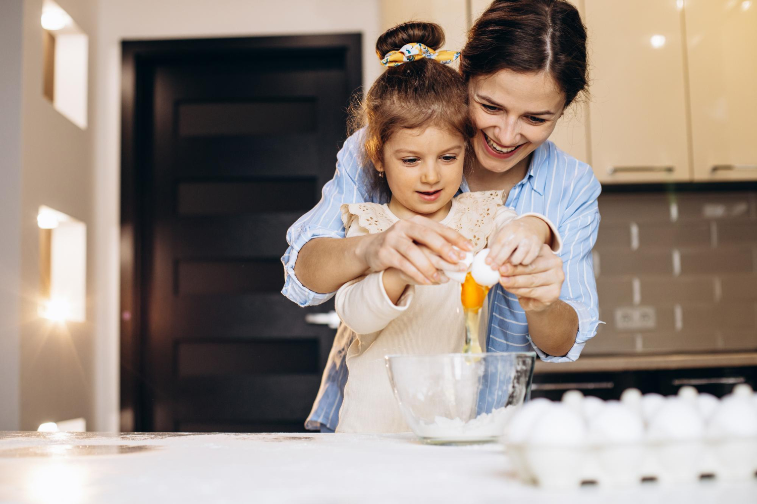 mother-with-daughter-prepring-dough-baking